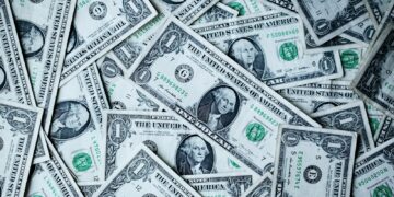 Billetes de un dólar estadounidense, en alusión a la economía y la Reserva Federal